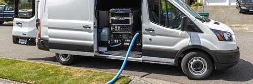 Everest truckmount cleaning system installed inside a white service van.